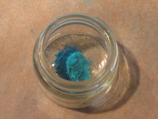 Verdigris pigment in a pot, week one.